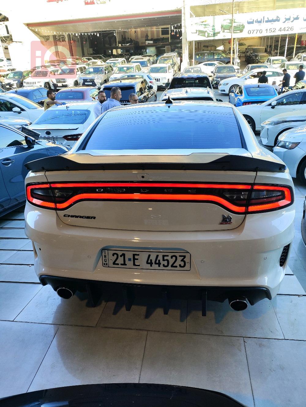 دۆج چارجەر